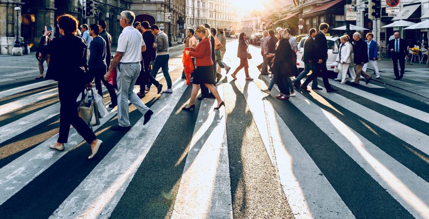 group of people crossing the street