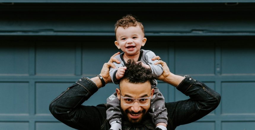 father holding his son, father's Day,