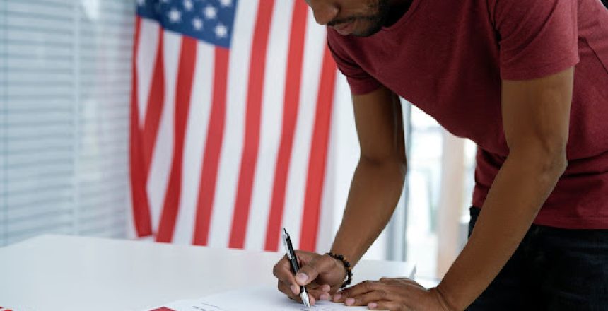 man voting at polling location