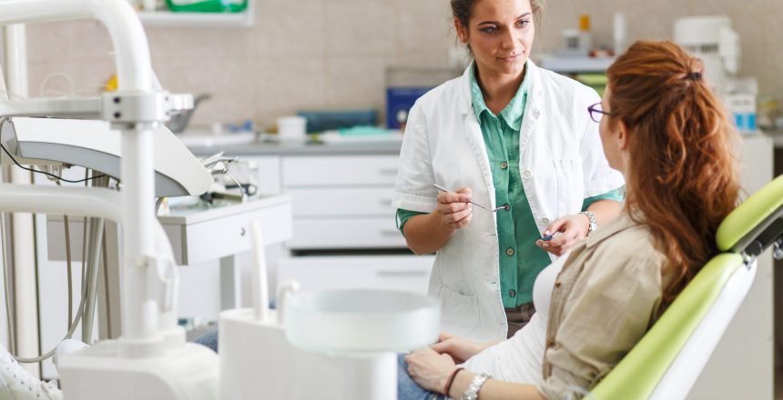 woman at dentist, dentist speaking to patient, dentist treating patient, september featured audience, healthcare provider, healthcare audience