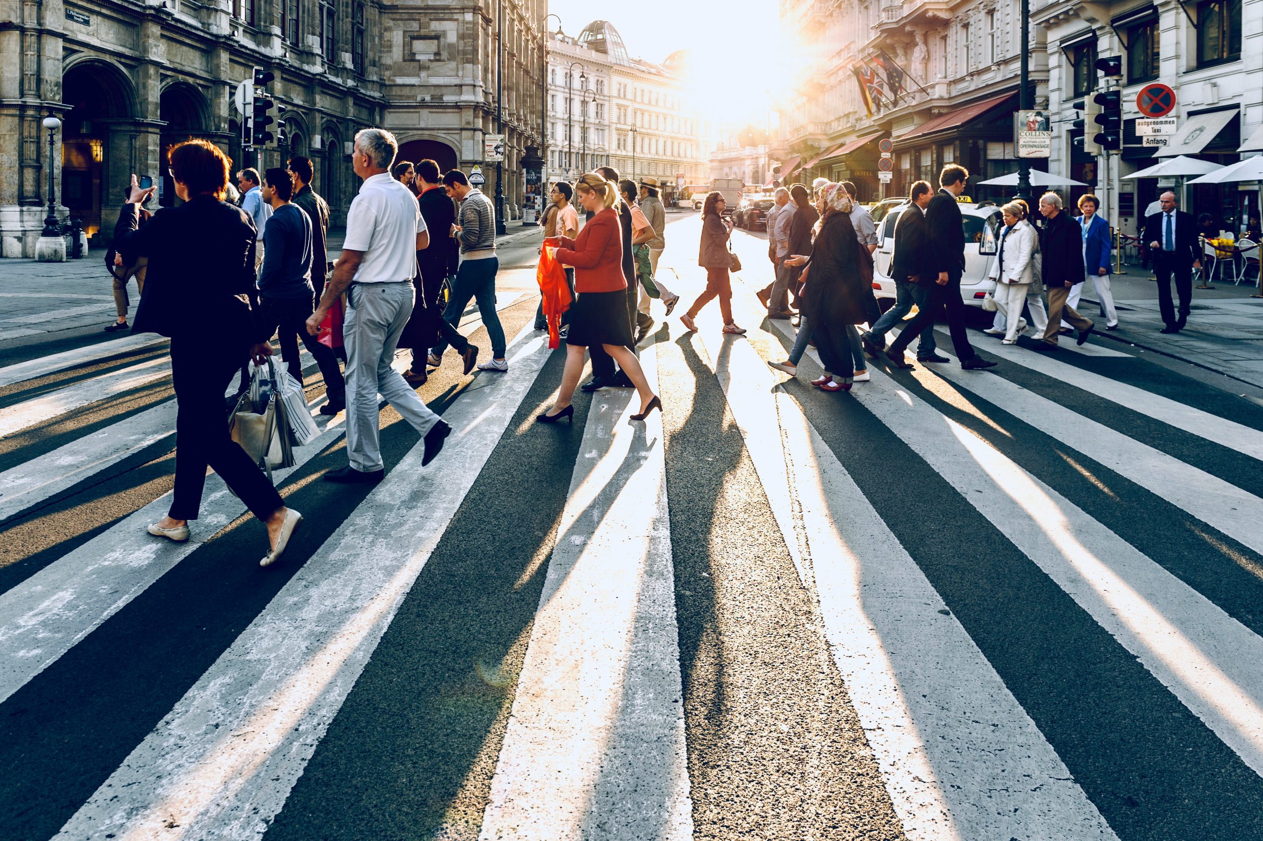 group of people crossing the street