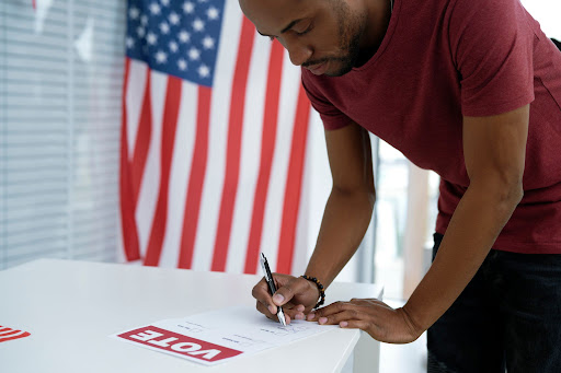 man voting at polling location