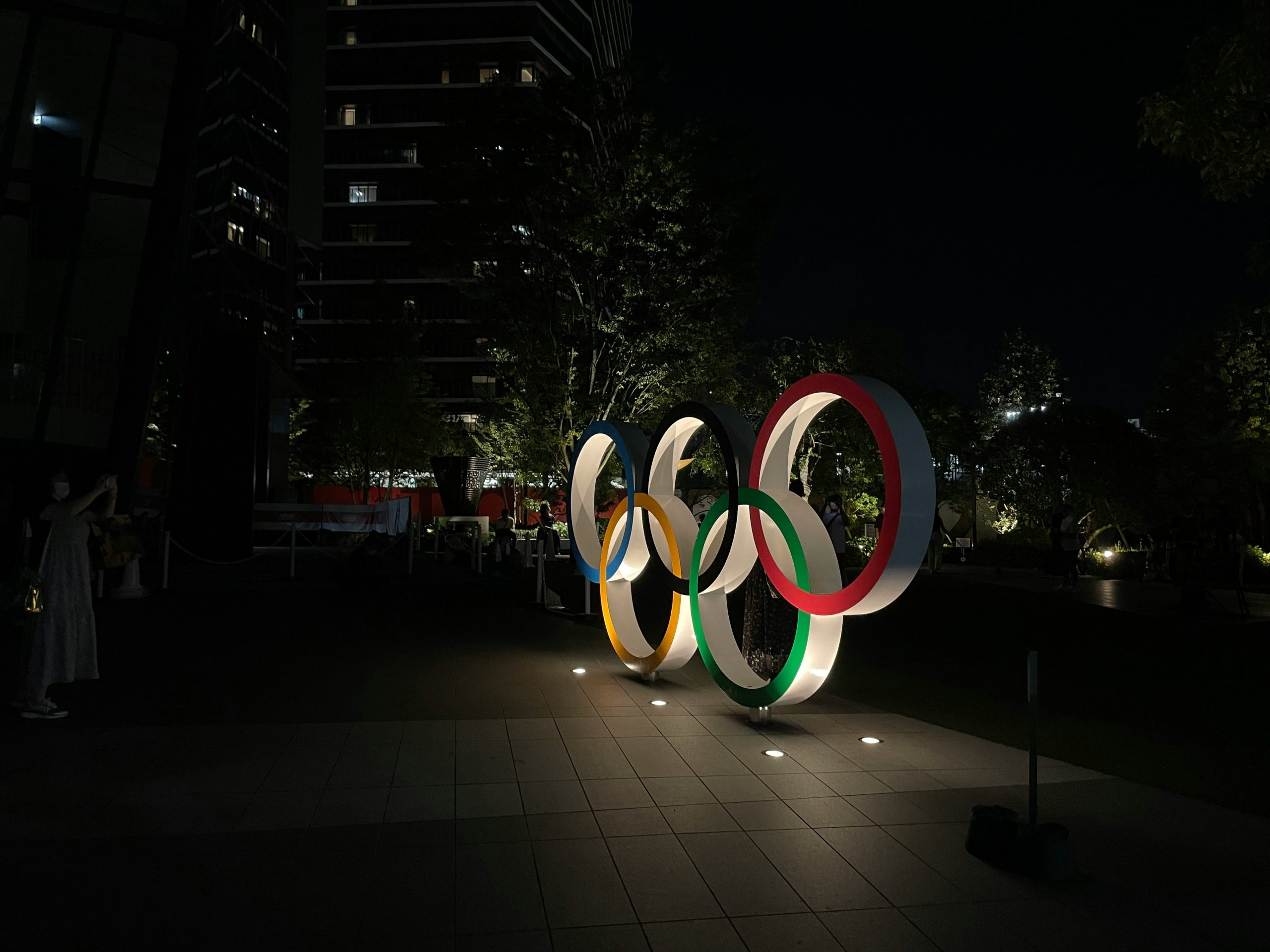 Olympics logo lit up at night