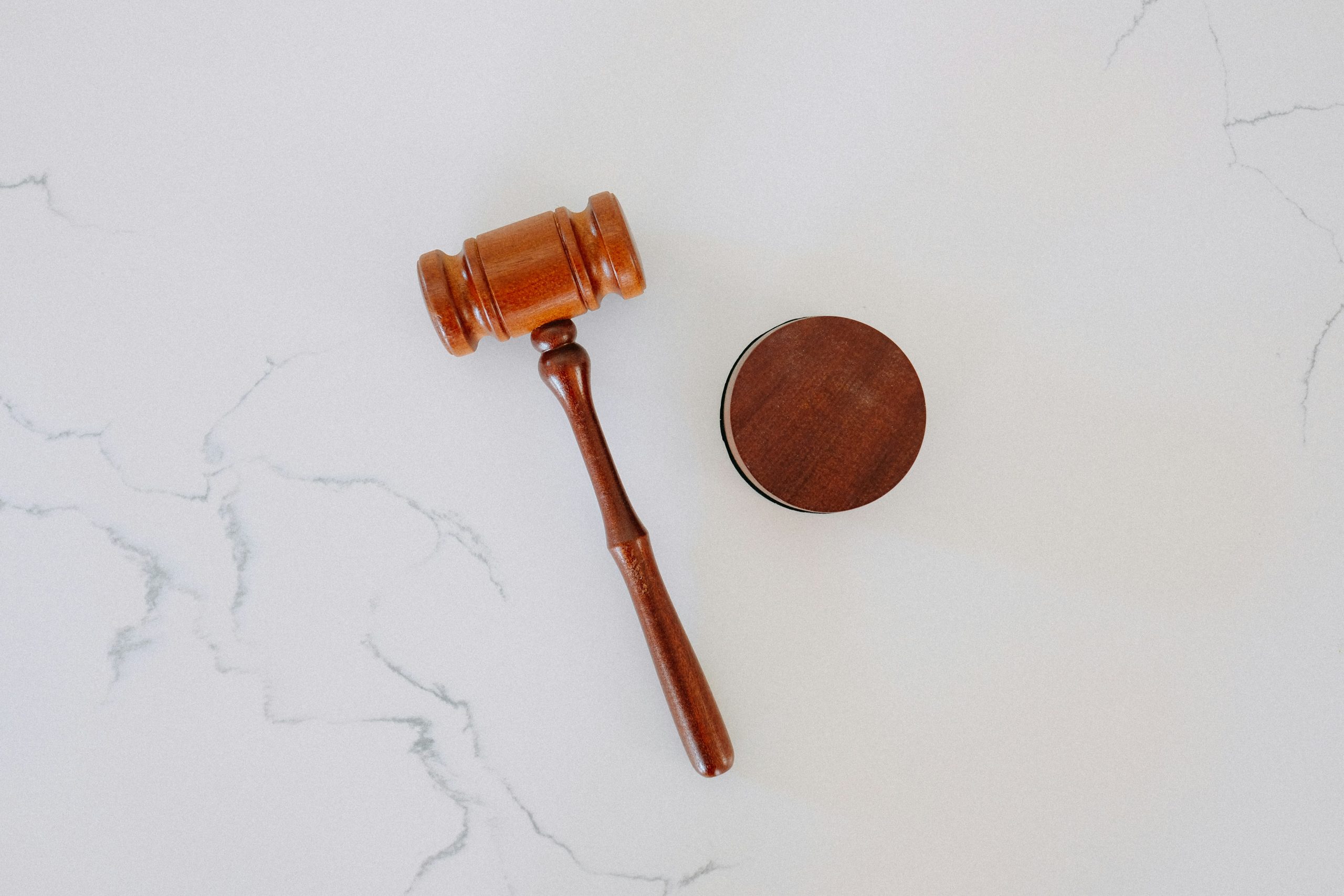 wooden gravel placed against a white marble backdrop